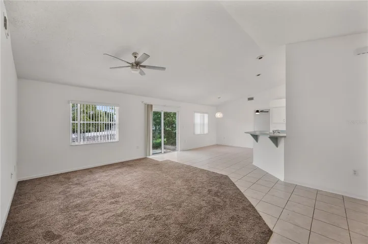 Living room with sliding doors to backyard