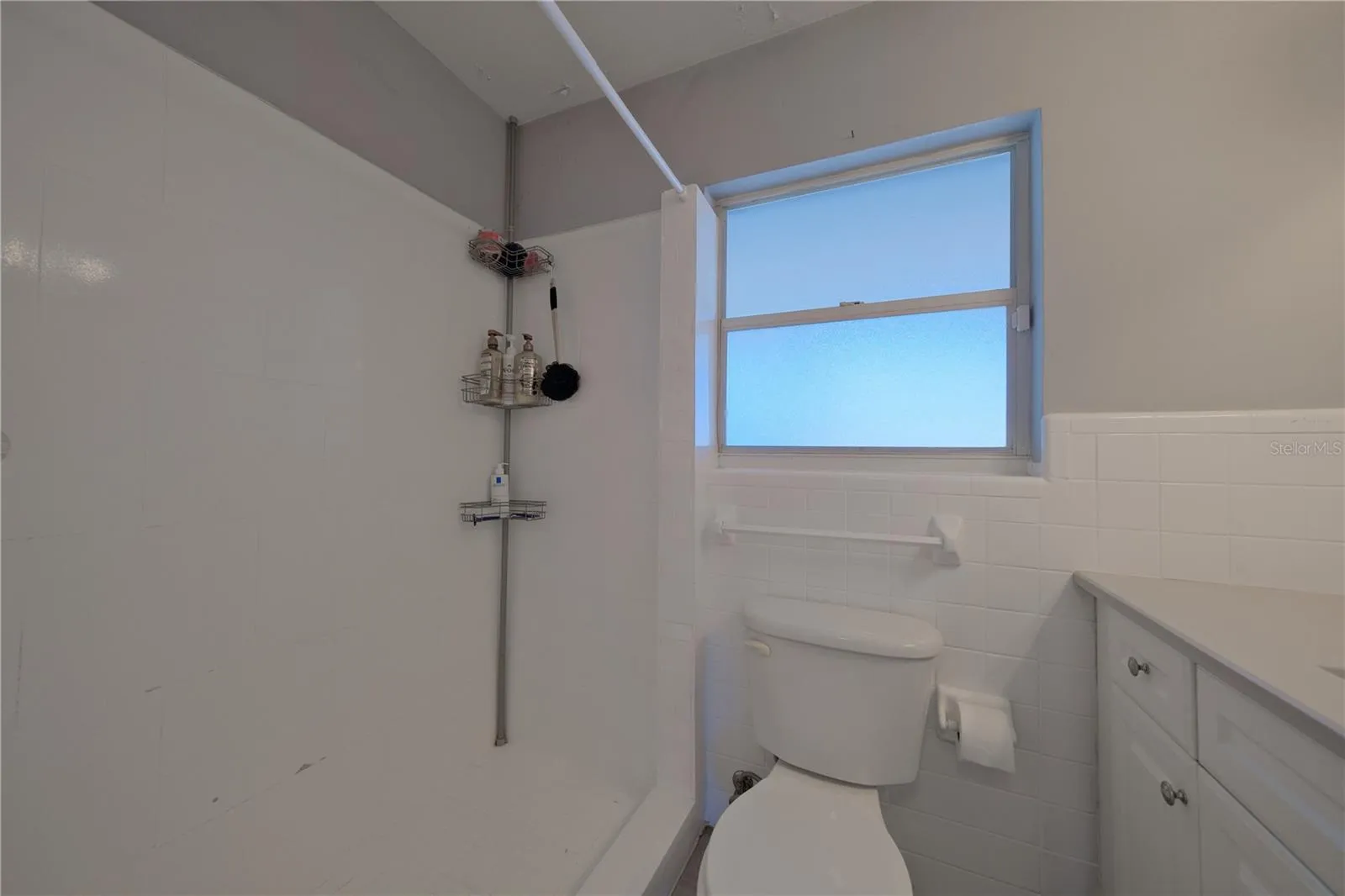 Unit A Bathroom Step in Shower