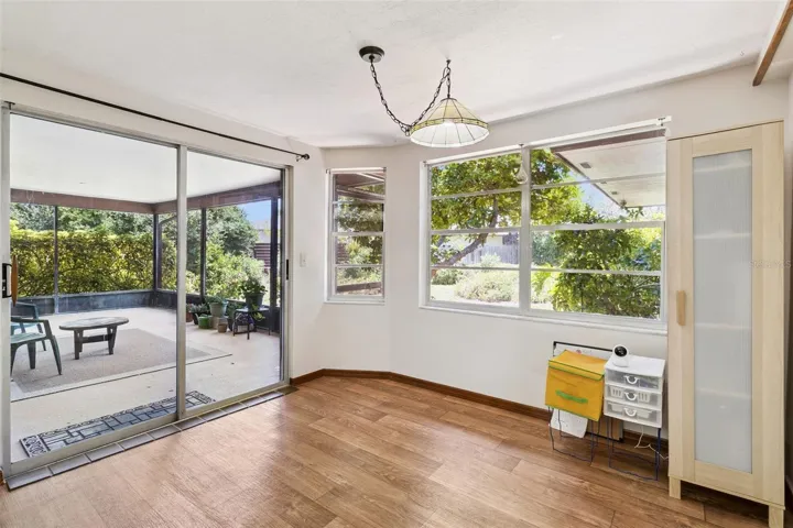 Breakfast Nook with sliders to the screened in porch