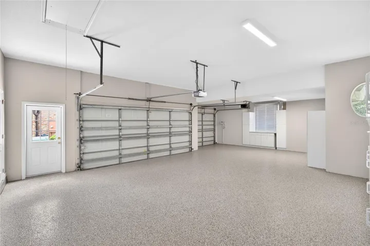 Newly finished garage with durable epoxy flake flooring 2026  *Lifetime Warranty*