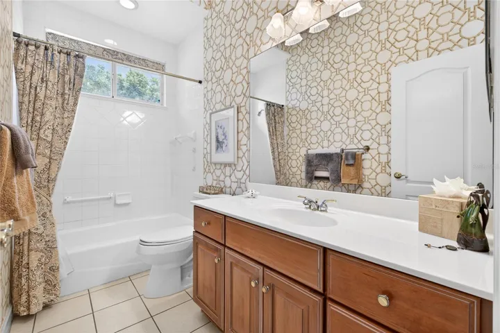 Full tub bath shared between bedroom two and three.