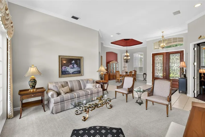 View through living room to foyer entrance.