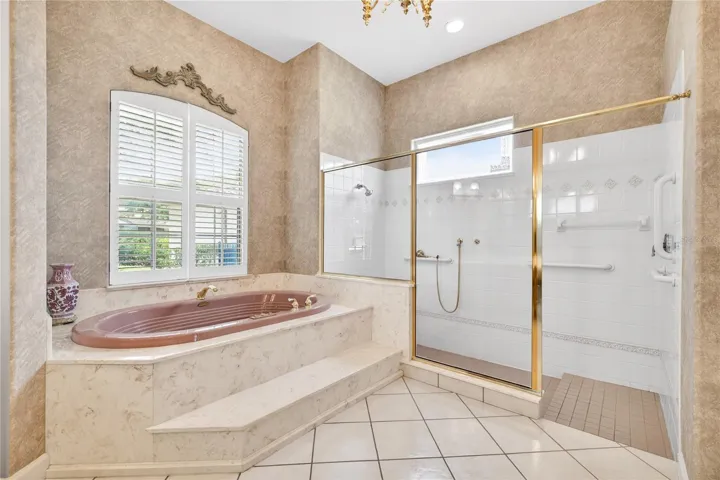 Garden tub and walk in shower.