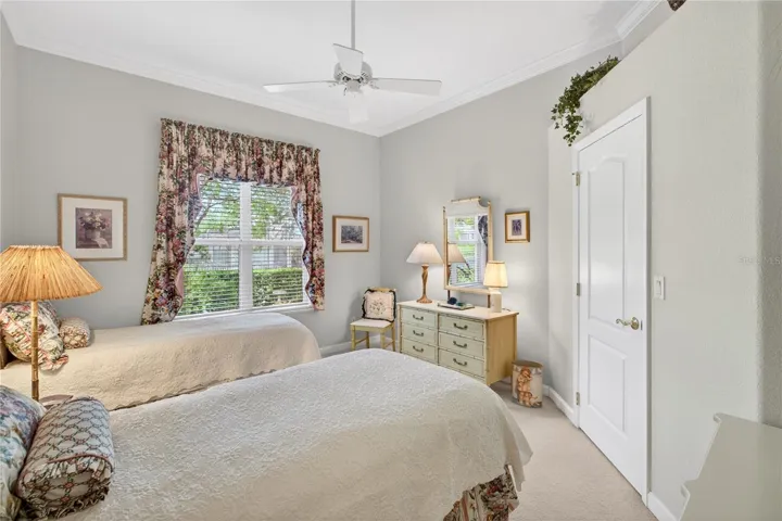 Bedroom three features a walk-in closet.