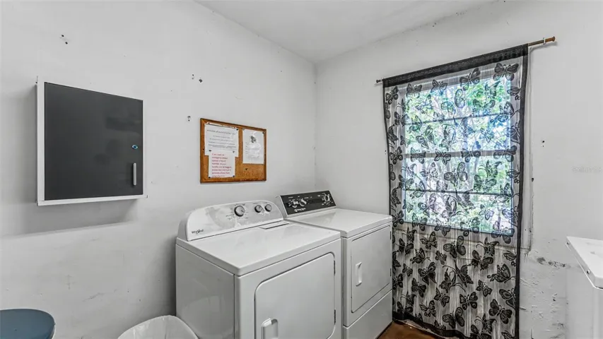 laundry room, just steps outside your door down the hall