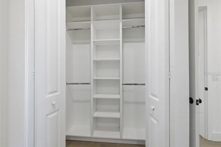 primary bedroom walk in closet