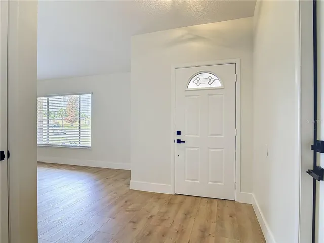 Front Door leading into the Living Room.