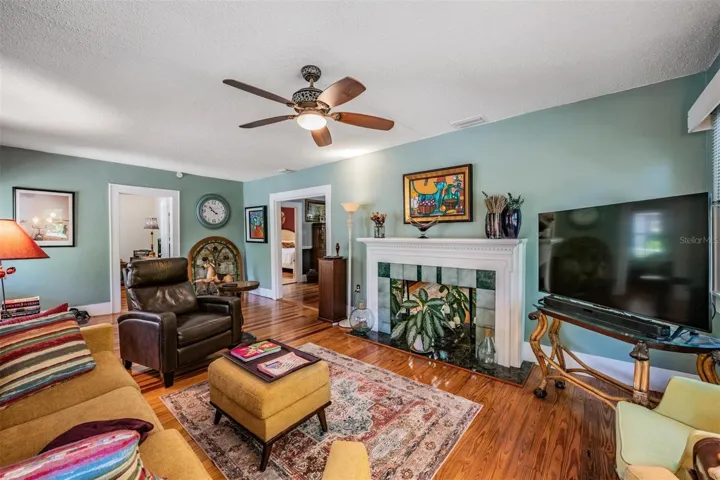 Living room with original hardwood floors.