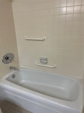 guest bathroom tub and shower.