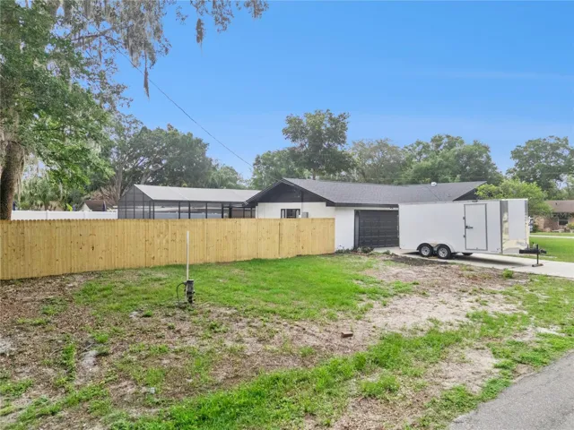 Side of Yard with a garage