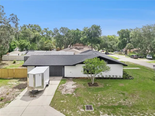 Side of Yard with a garage