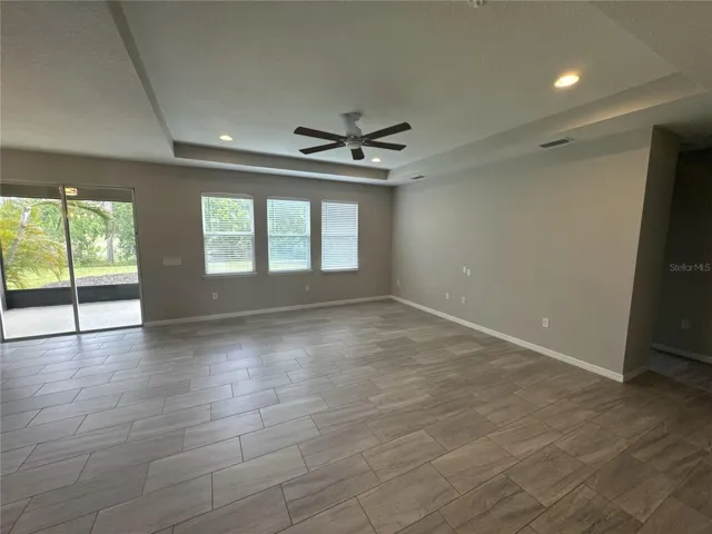 living room off of kitchen/breakfast nook area
