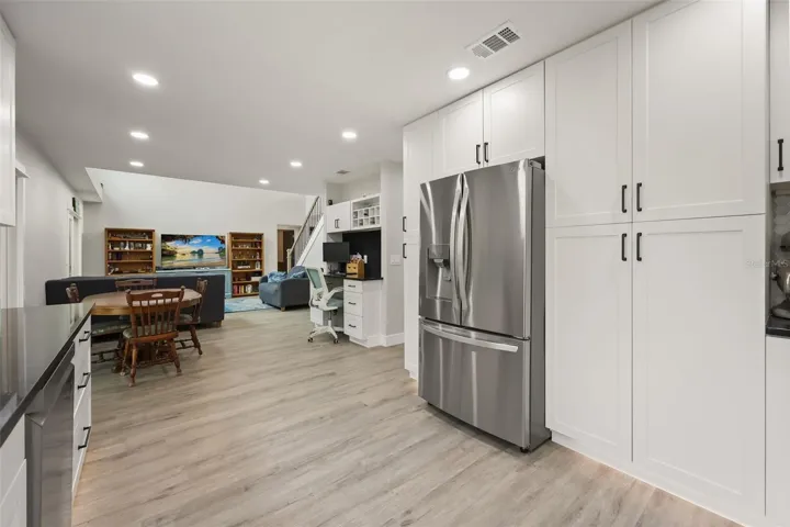 kitchen into breakfast nook & living room