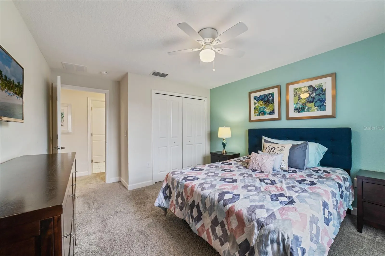 Two additional bedrooms, another full bath, and a convenient LAUNDRY CLOSET complete the second floor. Bedroom 3