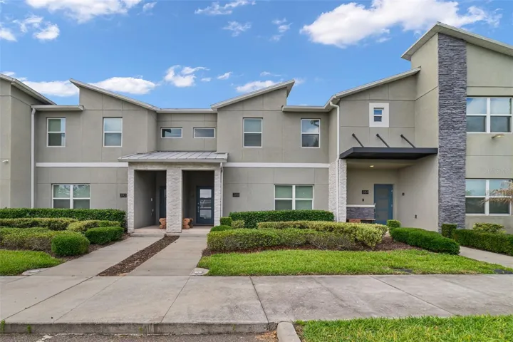 Welcome to this BEAUTIFULLY MAINTAINED 4-bedroom, 3-bath townhome in the HIGHLY SOUGHT AFTER Stoneybrook South at ChampionsGate, where resort-style living, modern comfort, and incredible INVESTMENT POTENTIAL come together perfectly.