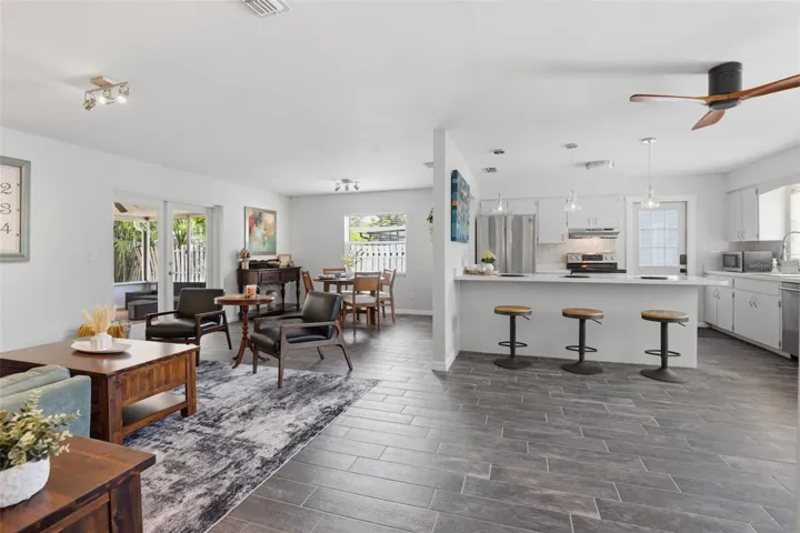 Step inside and instantly feel at ease as the inviting family room welcomes you with the perfect space to relax, unwind, and feel right at home.