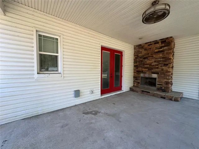 Outdoor Fireplace Outside Primary Bedroom