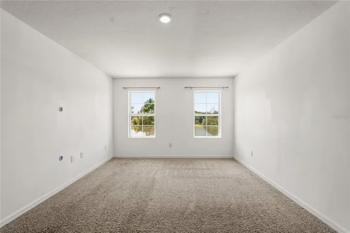 Master bedroom overlooking the pond across the street