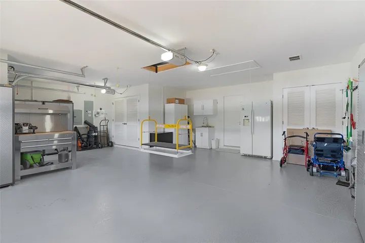 Epoxy floor in 2 car with golf cart garage