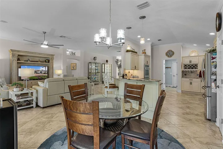 View from eat-in area through kitchen & living room