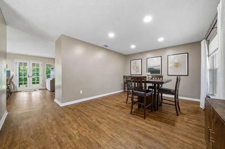 Dining Room **photos on the wall are virtually staged)