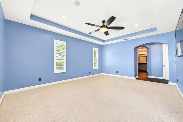 The main floor primary suite becomes your tranquil retreat.