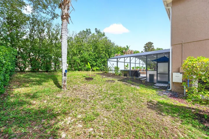 Green space in addition to the private screened pool/spa.