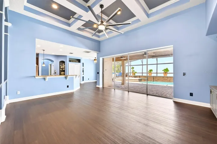 A wall of sliding glass doors makes this beautiful home feel light, bright and airy.