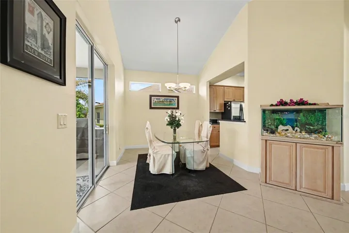 Dining Area off Kitchen, with access to back screened patio