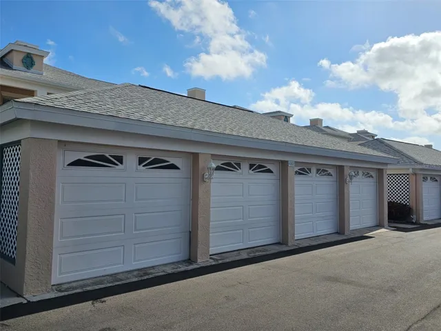 Detached garages, 2nd from left