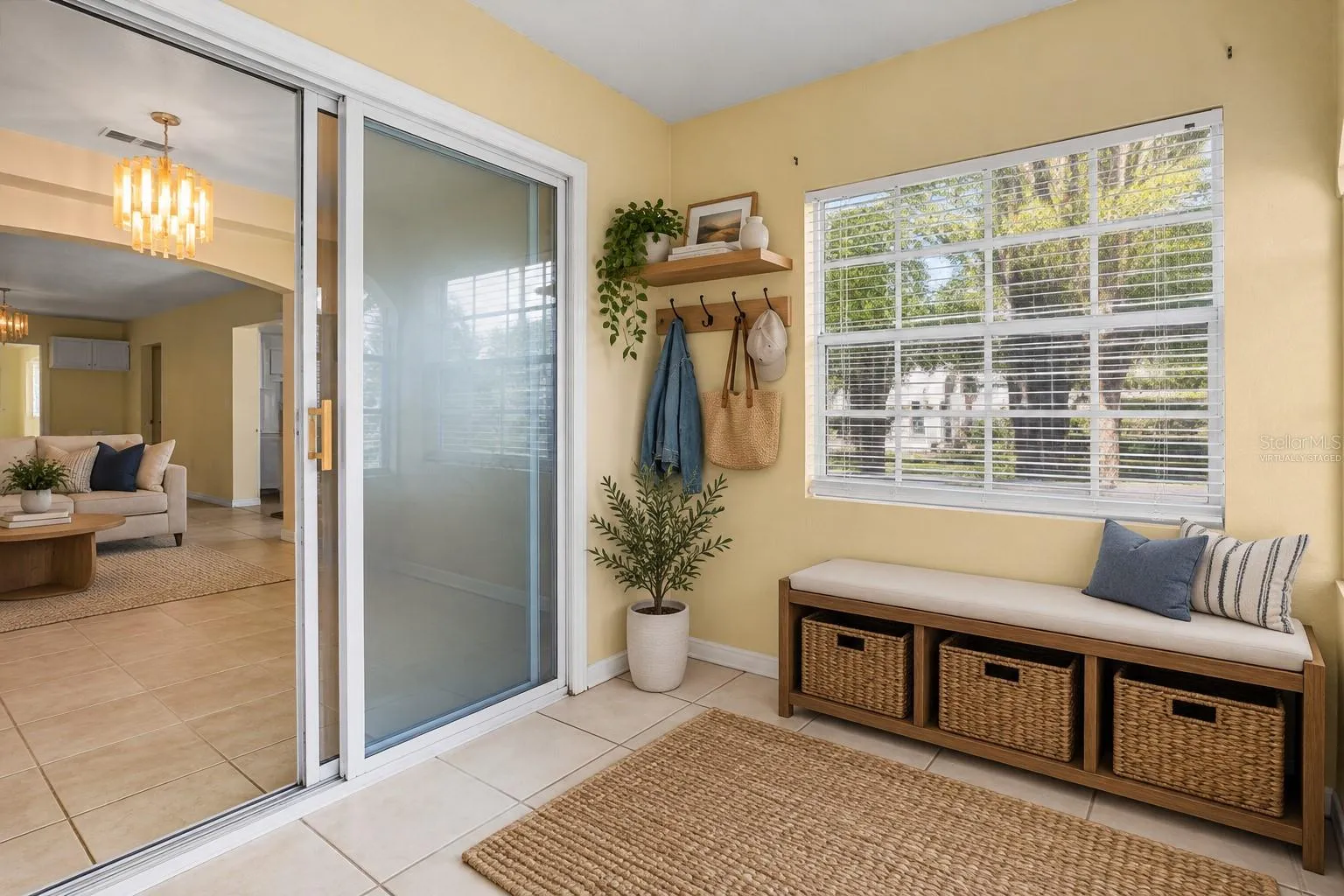 Virtually staged mudroom/entryway