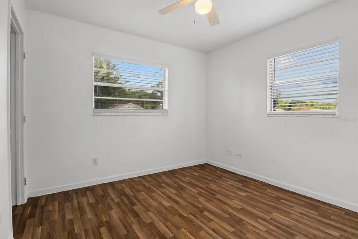 Bedroom 3 with luxury vinyl plank flooring