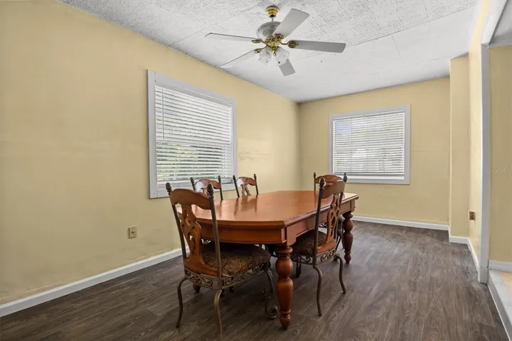 Family room with newer luxury vinyl flooring.