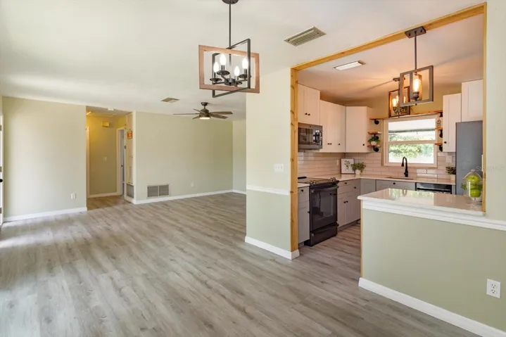 from dining room looking into kitchen and living room