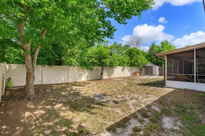 spacious backyard with storage shed