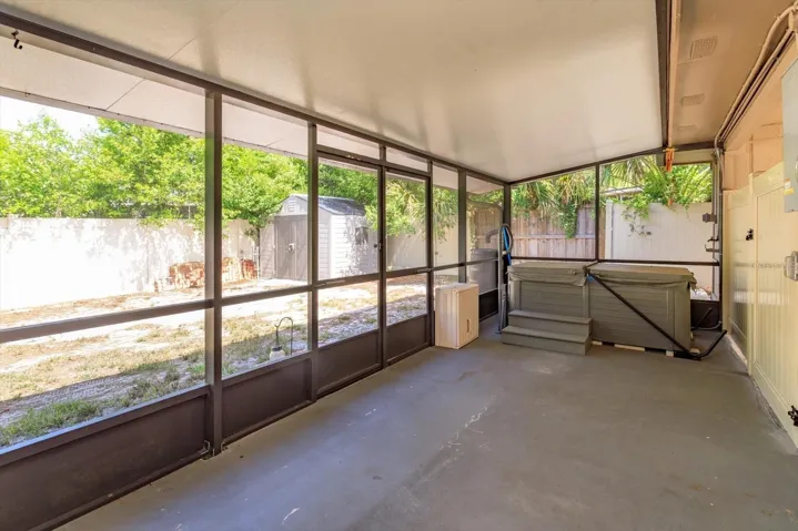 large screened lanai with hot tub