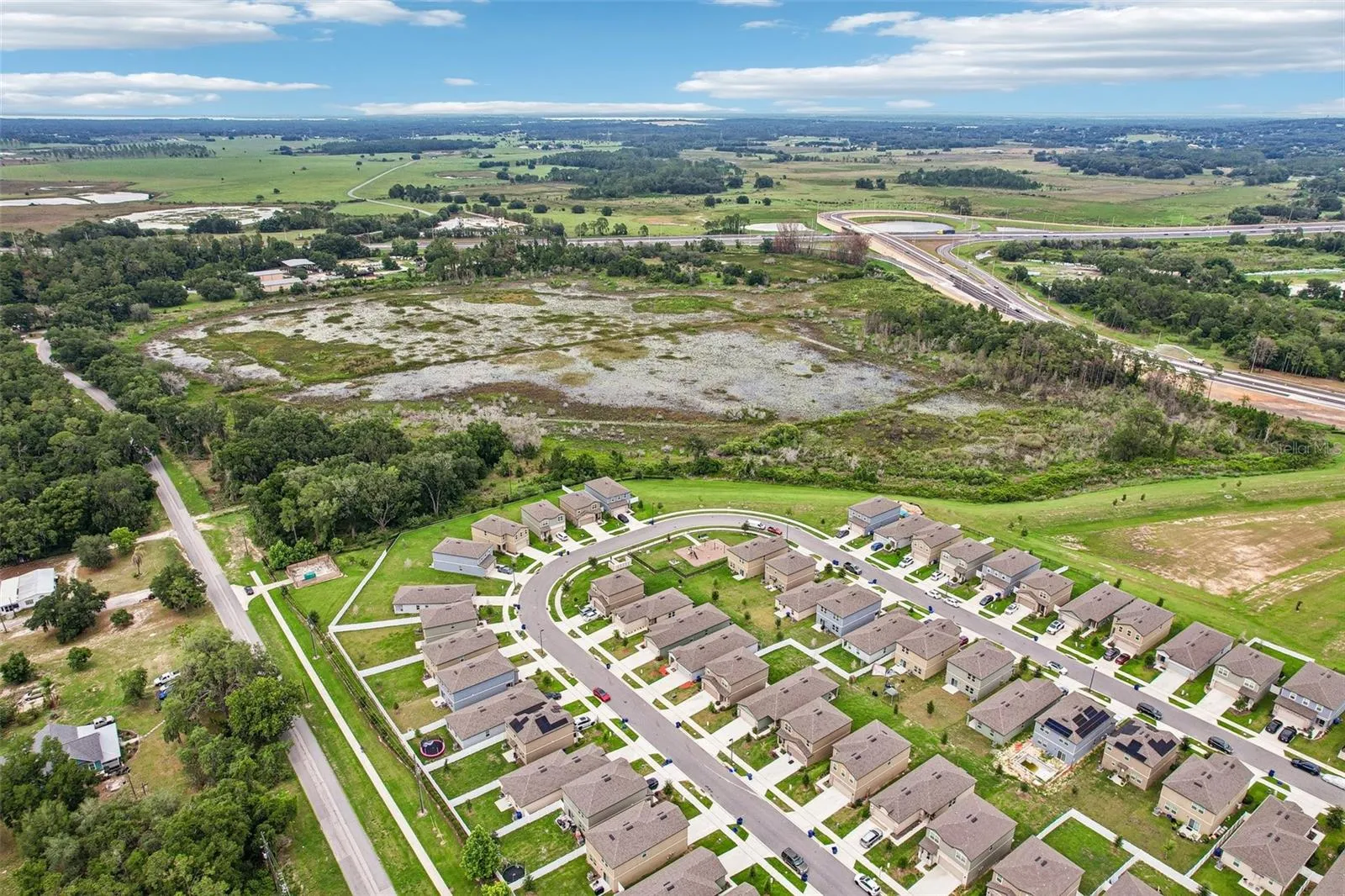 Rarely does a property of this size, setting, and potential become available in such a desirable Groveland location.