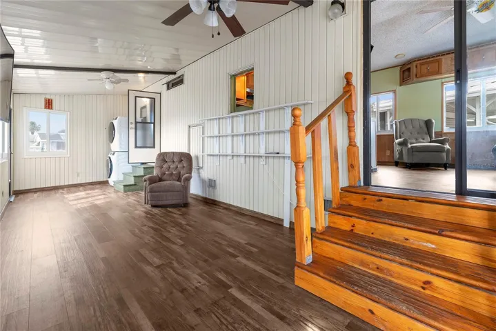 Steps lead from Florida room into the main living space