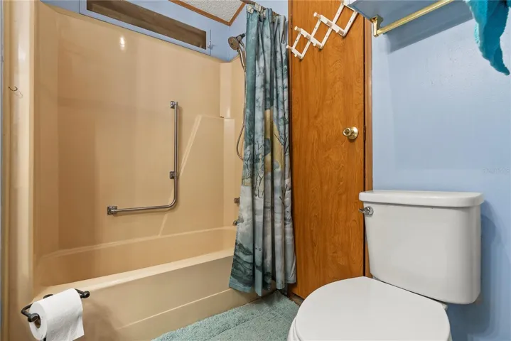 Family bathroom with tub and shower