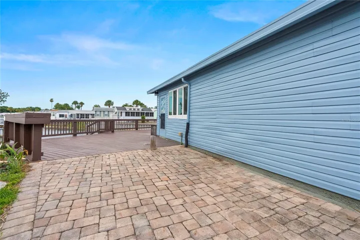 Decorative patio to the left side of the propeprty