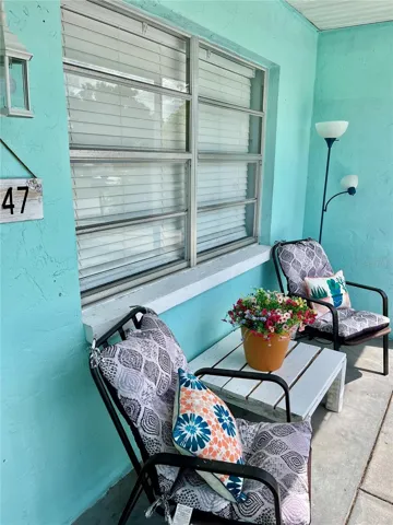 Relax on your front porch (screened).