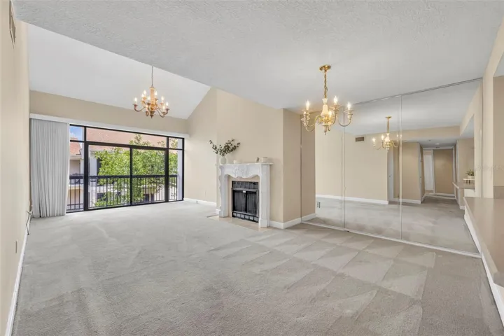 A wood buring fireplace serves as the focal point of the living room.