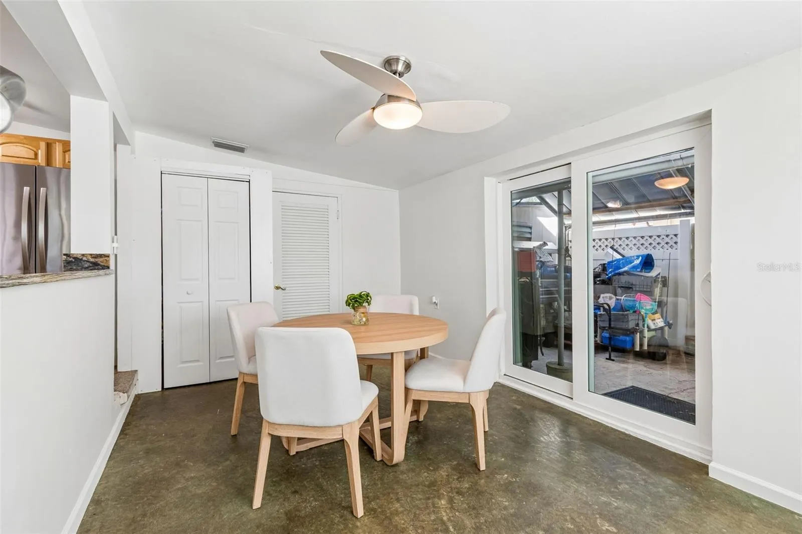 Flex space with attached laundry/storage room