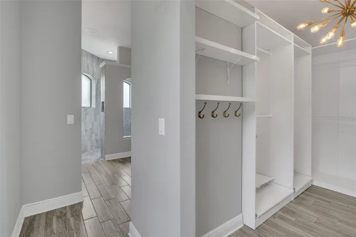 Primary closet to bathroom