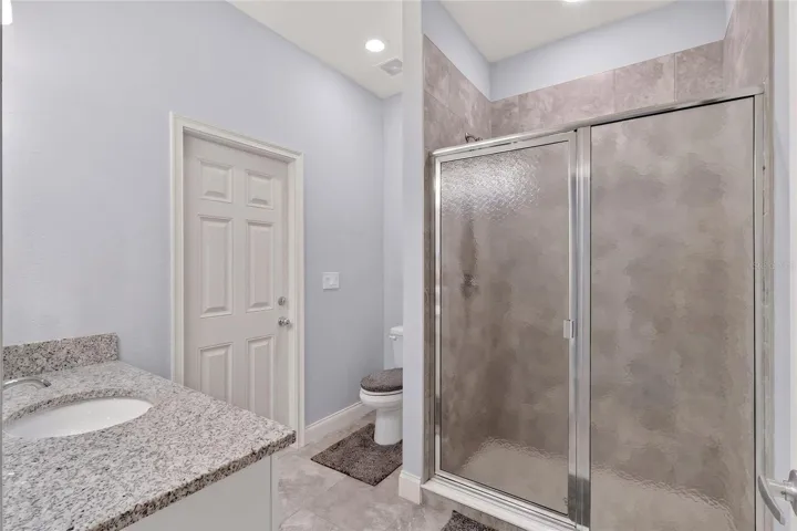 Bathroom 3 with door leading out to lanai