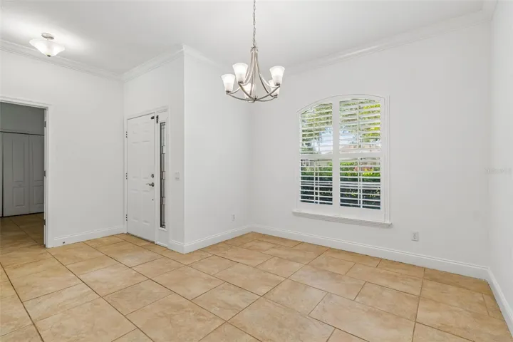 Formal dining room filled with light