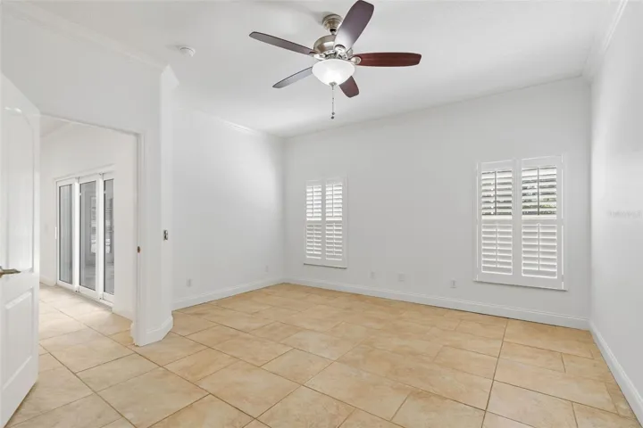 Primary suite overlooking pool