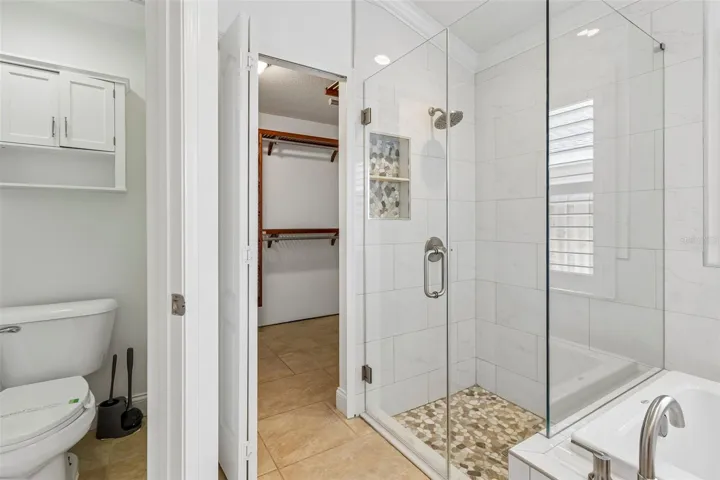 Primary water closet, and entry to walk in closet