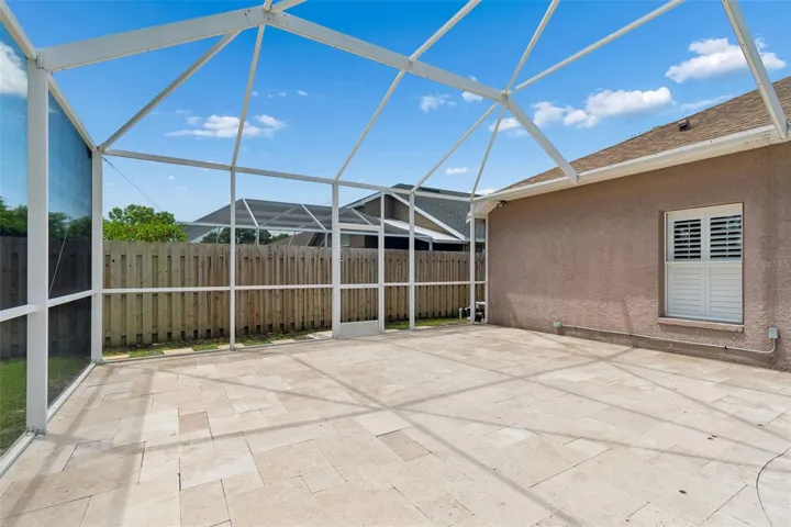 extra large travertine pool deck for entertaining