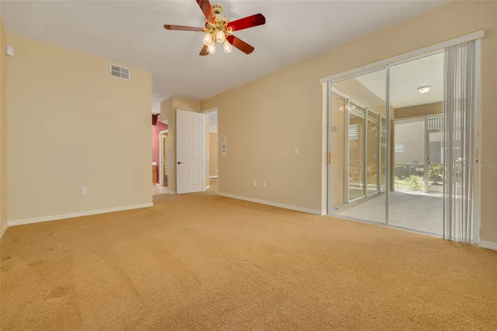 Primary bedroom with door-free entry to the bathroom